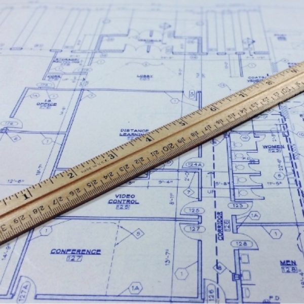 ruler over construction blueprint